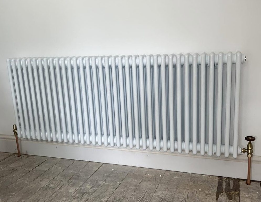 Lovely vintage column radiator fitted today with brass valves